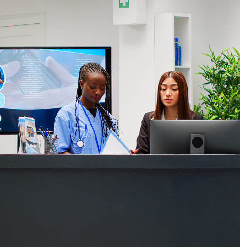 two professional woman working